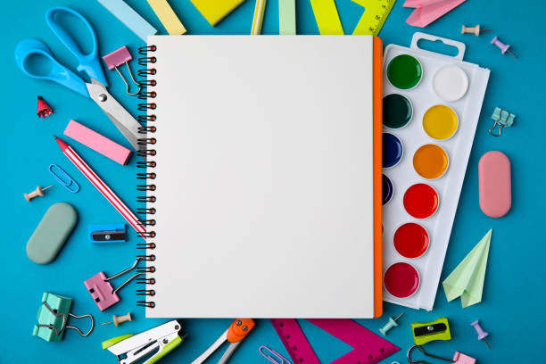 istock Different school stationery items and notebook on light blue background, flat lay with space for text. Back to school 1818882353