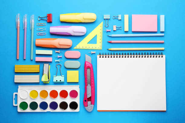 istock Different school stationery on light blue background, flat lay. Back to school 1818882882