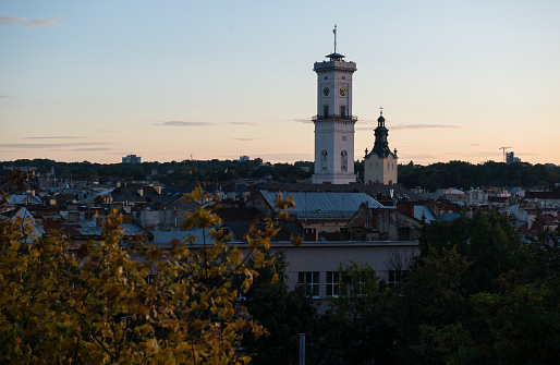 View of the historical part of the Lviv city and Town Hall in the evening, Ukraine