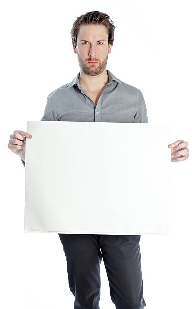 istock Attractive man wearing a grey shirt isolated on white background 181888528