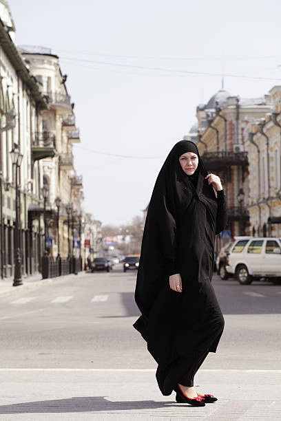 istock young woman in Muslim clothes 181888891