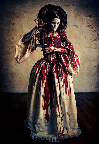 Bloody Mary Fictional Character "Bloody Mary SeriesBloody Mary is a ghost or witch featured in modern American folklore. She is said to appear in a mirror when her name is called three times or sometimes more while in a dark room, depending upon the version of the story, often as part of a game or dare." fx stock pictures, royalty-free photos & images