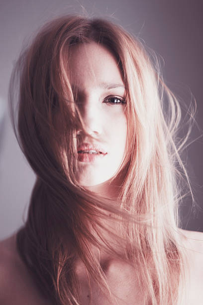 istock Beautiful young woman's face portrait 181889224
