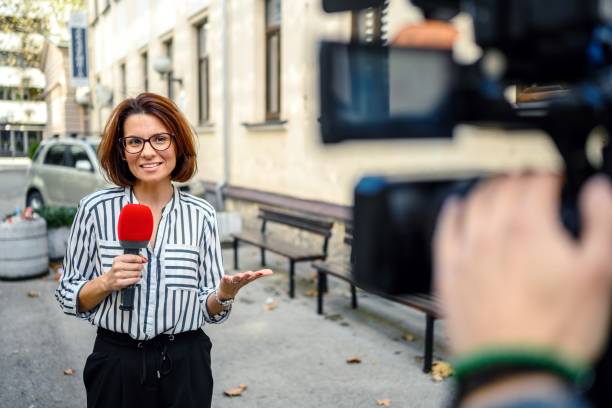 istock Female TV reporter 1818893307