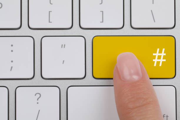 istock Woman pressing yellow button with hashtag sign, top view 1818894941