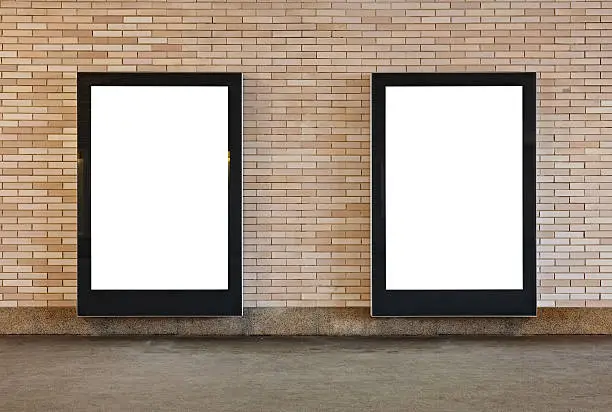 Blank billboards in a metro station-Clipping paths of billboards included.