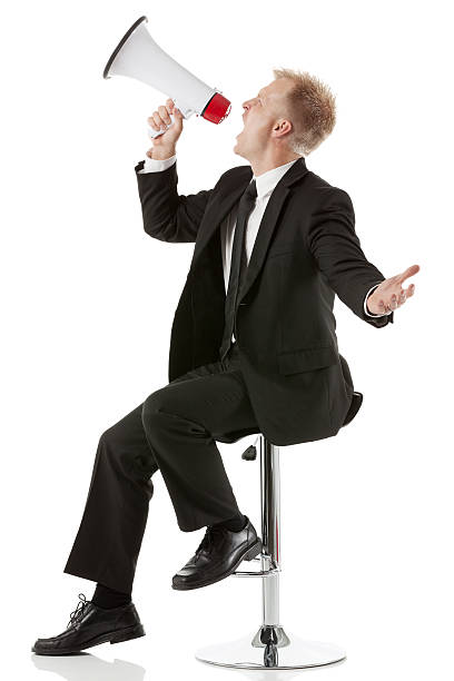 istock Businessman shouting into a bullhorn 181889566