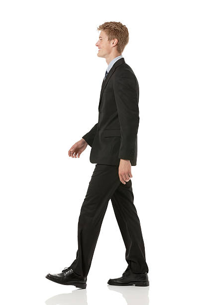 istock Profile of a businessman walking 181890229