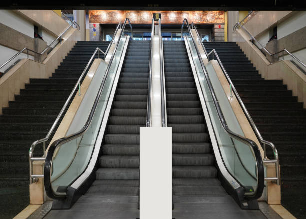 istock Bottom view of escalator in a shopping center 1818902730
