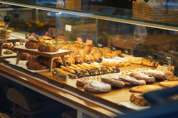 istock Croissants and various pastries on the display of a store 1818903300