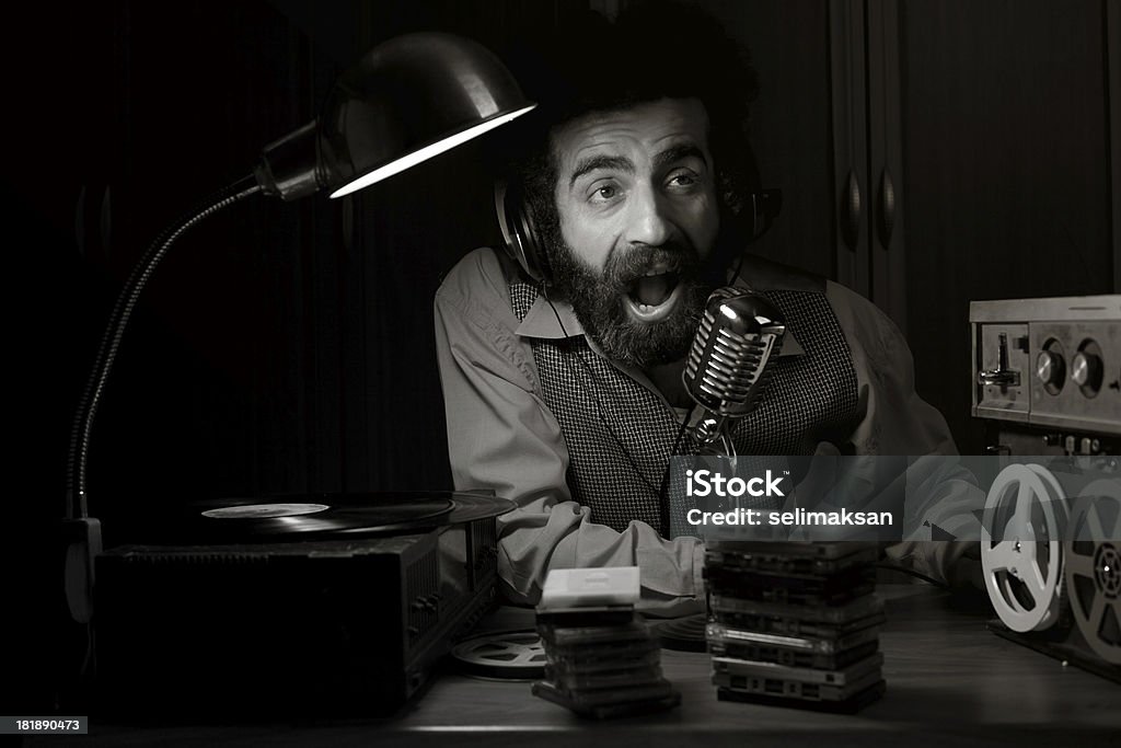 Old fashioned radio disc jockey broadcasting Podcasting Stock Photo