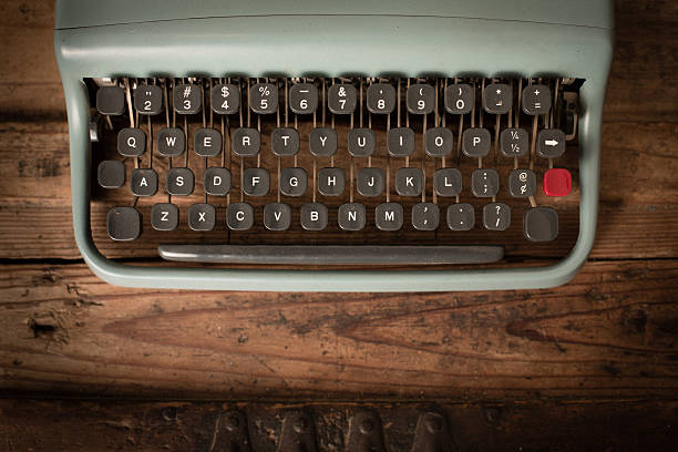 ティール色の画像、ヴィンテージの手動タイプライター、コピースペース付き - typewriter key typewriter keyboard blue typebar ストックフォトと画像