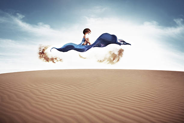 Magic carpet Young woman in sand dunes mui ne bay photos stock pictures, royalty-free photos & images