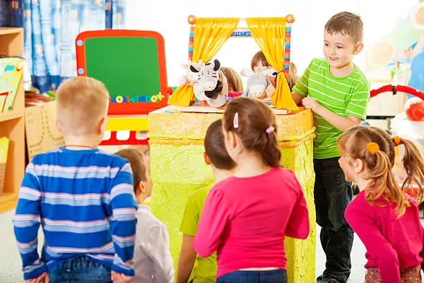 Photo of Children Playing Finger Puppet Show.