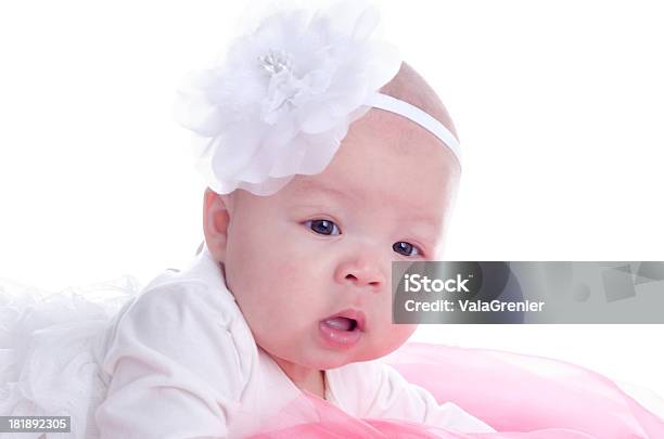 Baby Girl Laying On Front With Head Up Stock Photo - Download Image Now