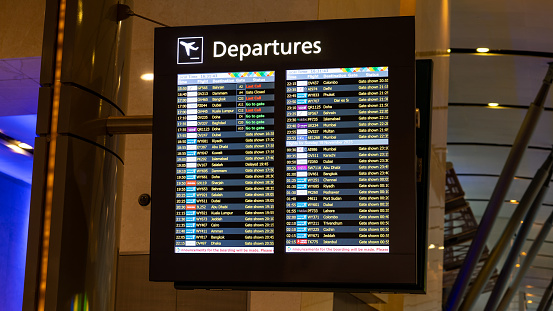 Hong Kong - May 22, 2023 : Departure gate for flight operated by Cathay Pacific to London Heathrow Airport at Hong Kong International Airport.