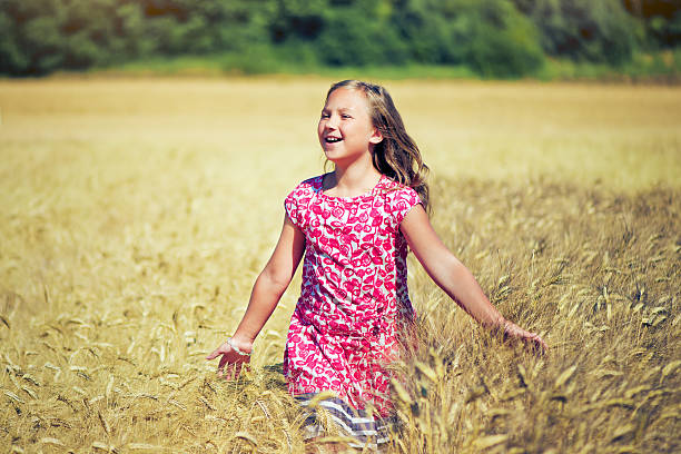istock Child in the wheat field 181892716