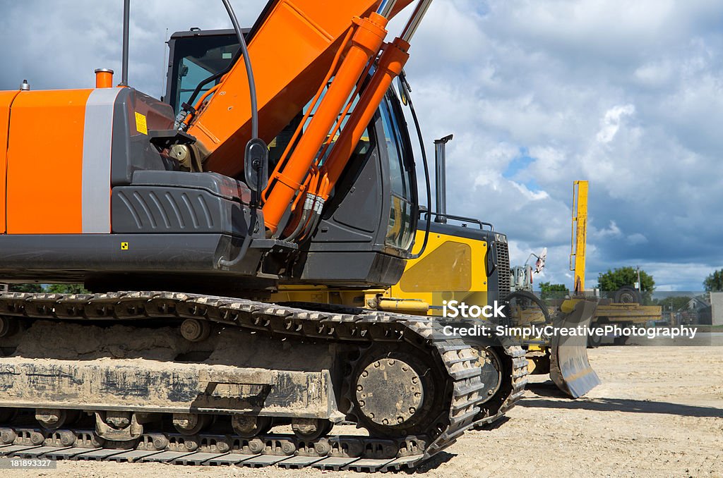 Fila di Attrezzatura edile in un Cantiere di costruzione - Foto stock royalty-free di Ambientazione esterna