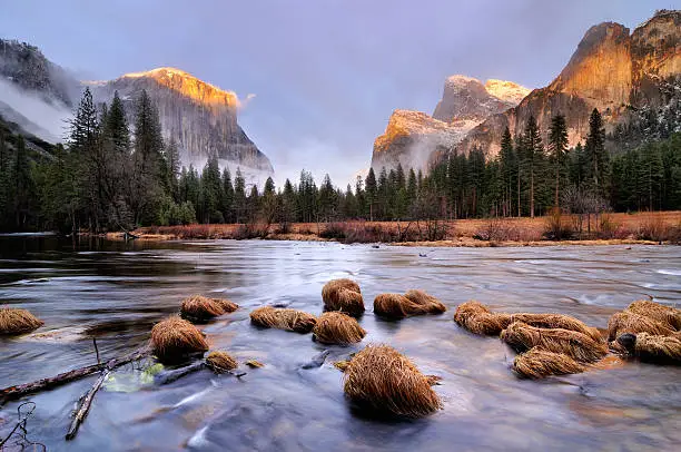 "Sunset landscape of El Capitan mountain and Merced River in Yosemity National Park, California, USA. Gates of the Valley viewpoint."
