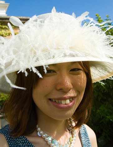 A Japanes lady attending a Wedding party. 