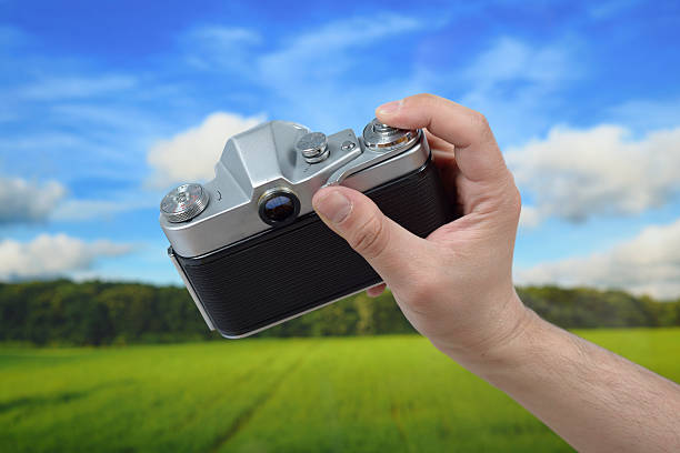istock Photographing landscape with an old photo camera 181893487