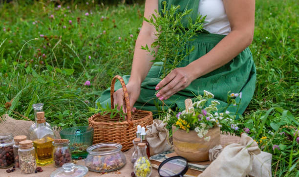 istock A woman makes herbal tincture. Selective focus. 1818938014