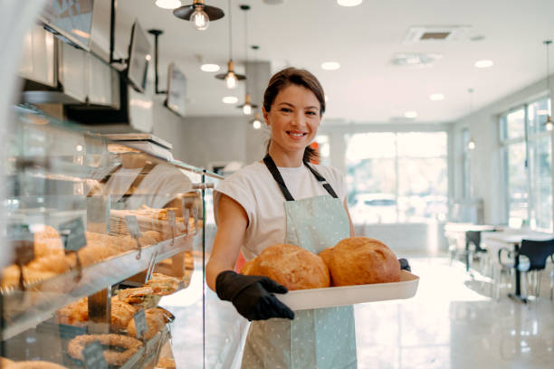 istock Proud baker showcasing her creations 1818938903