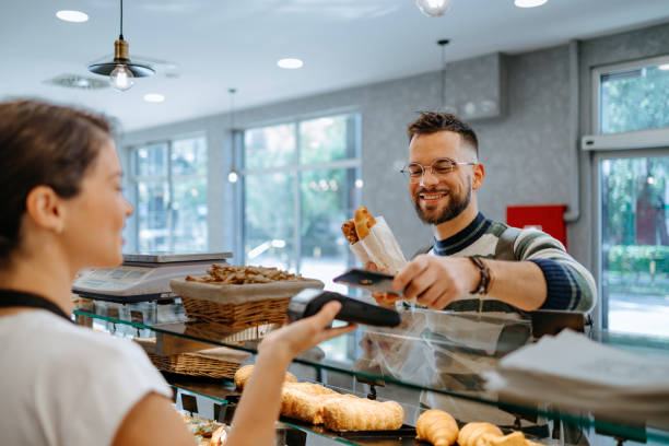 istock A sweet exchange at the bakery counter 1818939169