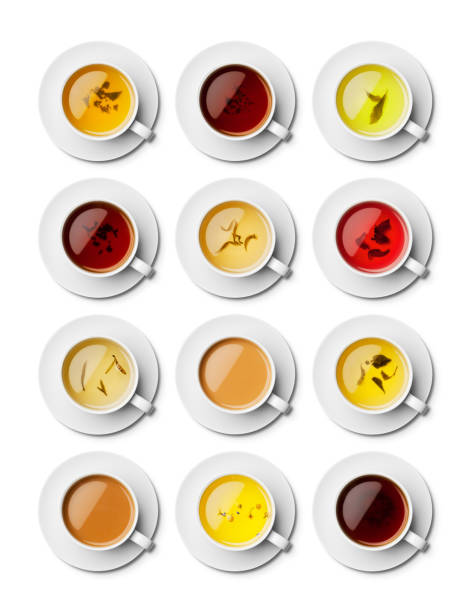 istock Different teas in white cups with saucers overhead 181894175