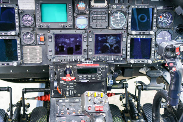 istock Interior view of helicopter Agusta cockpit with control pedals, dashboard, displays, selected focus 1818943052