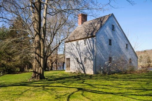 Built by Reverend John Smith c. 1675, this saltbaox style home in Sandwich, on the shore of Shawme pond,  is believed to be the oldest house on Cape Cod.