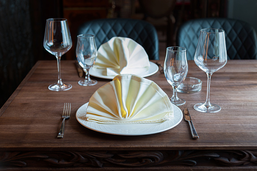 Glassware on the festive table. Glasses and wine glasses on the table.