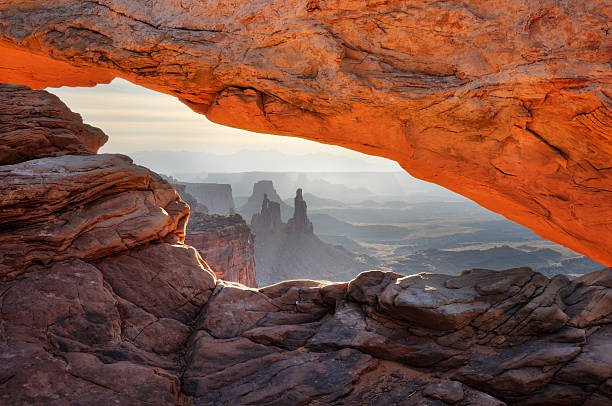Mesa Arch sunrise landscape in Canyonlands National Park stock photo