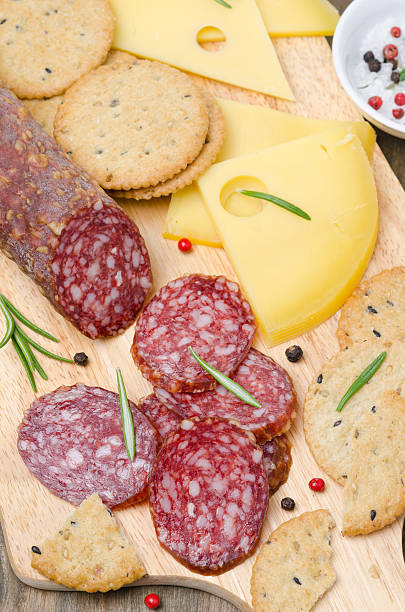 istock Italian salami, cheese and crackers on a cutting board 181895147