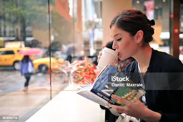 Reading Travel Guide Stock Photo - Download Image Now - New York City, Coffee - Drink, New York State
