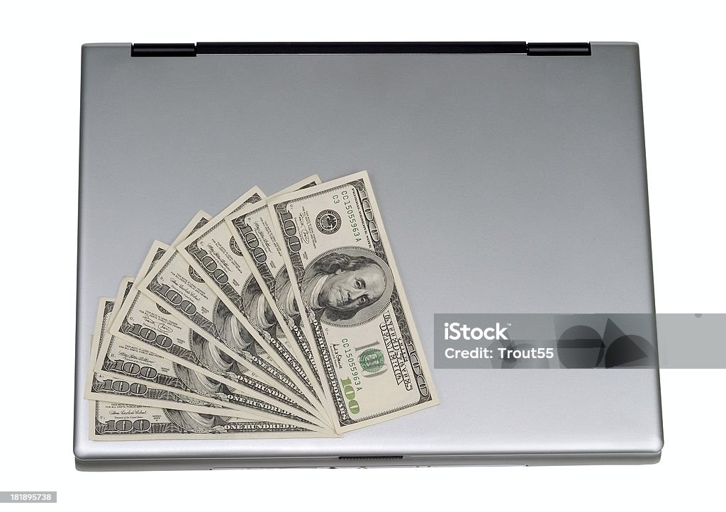 Computadora portátil y billetes de banco - Foto de stock de Arrugados libre de derechos
