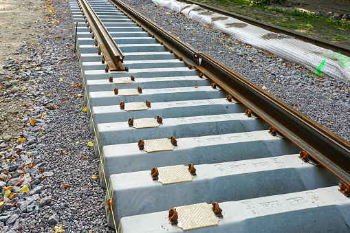 Laying new tram rails on new concrete sleepers with polyurethane pads that reduces vibration and noise emission, as well as isolates the rail