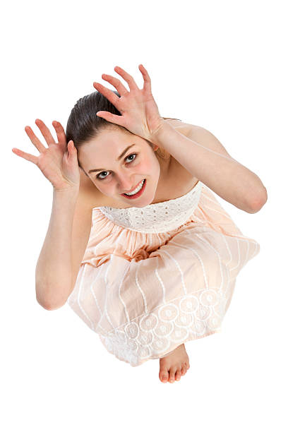 istock Cute young woman showing rabbit 181896030