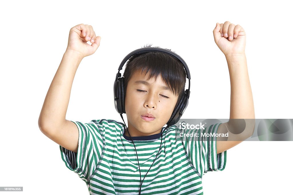 Garçon en écoutant de la musique - Photo de Enfant libre de droits