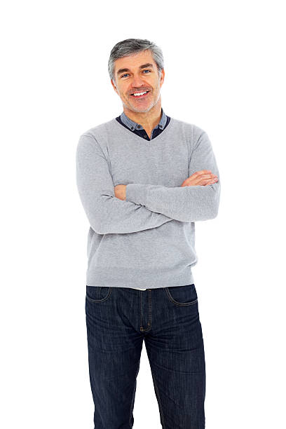 istock Confident mature man standing with his arms crossed over white 181897056