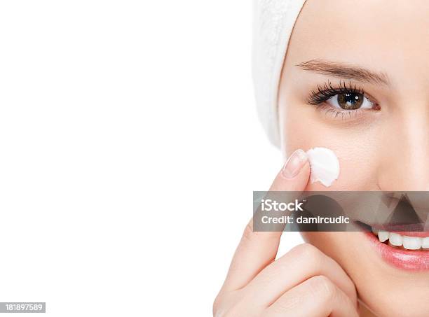 Woman Applying Moisturizer Stock Photo - Download Image Now - Moisturizer, Facial Mask - Beauty Product, Anti Aging