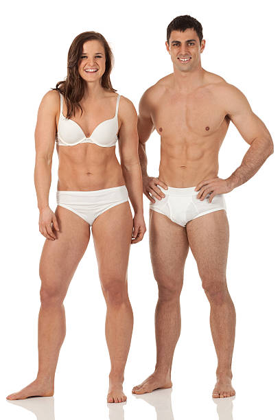 istock Smiling young couple in undergarments 181897690