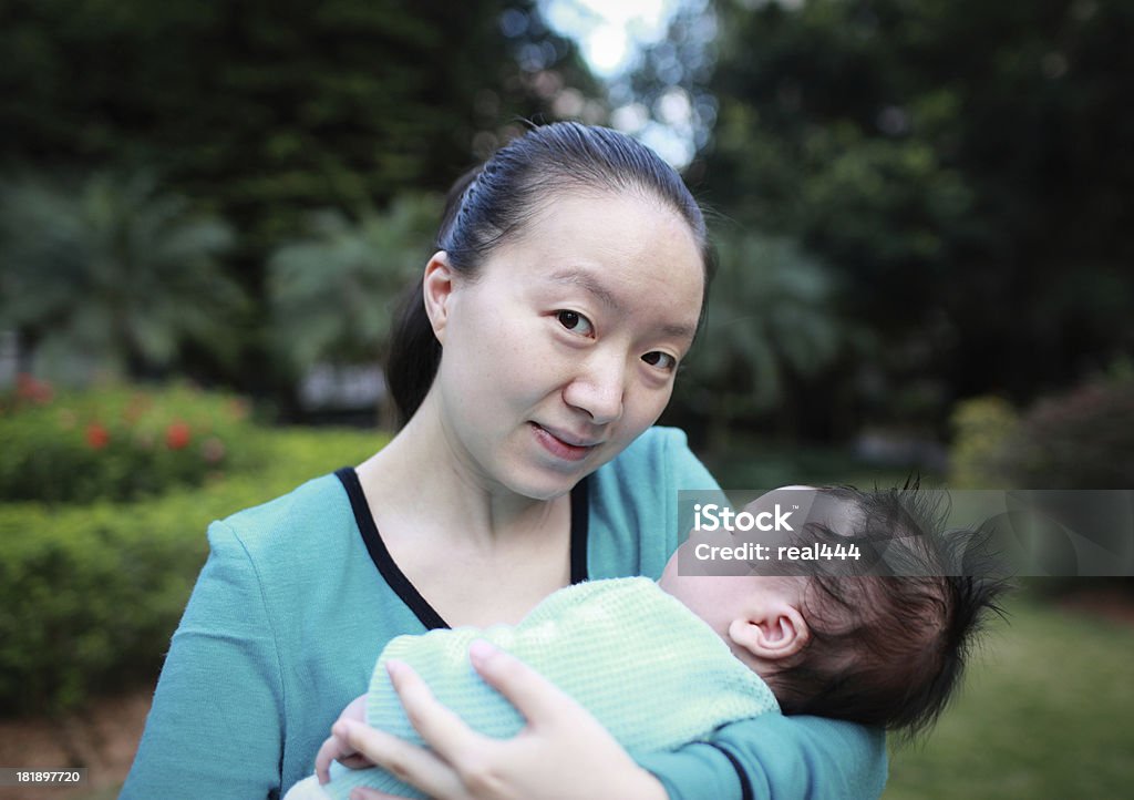 Happy Asian mother and son "A happy mom and her son, enjoying being together." 30-39 Years Stock Photo