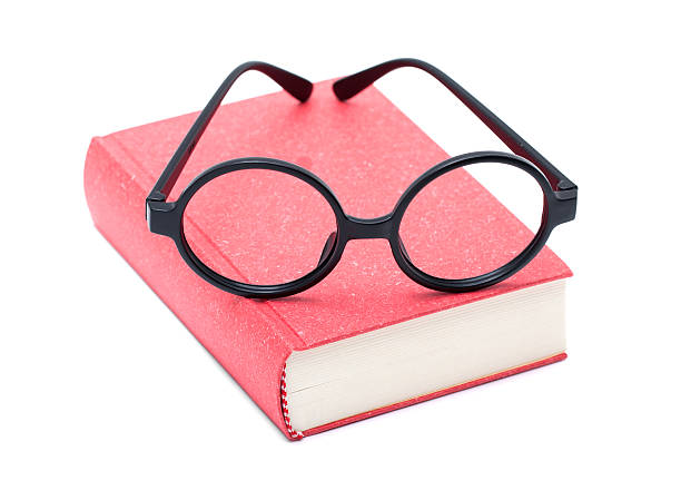 istock Book and glasses isolated on white background 181897877