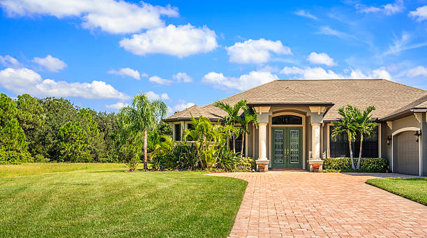 istock New upscale home with a beautiful green lawn 181897993
