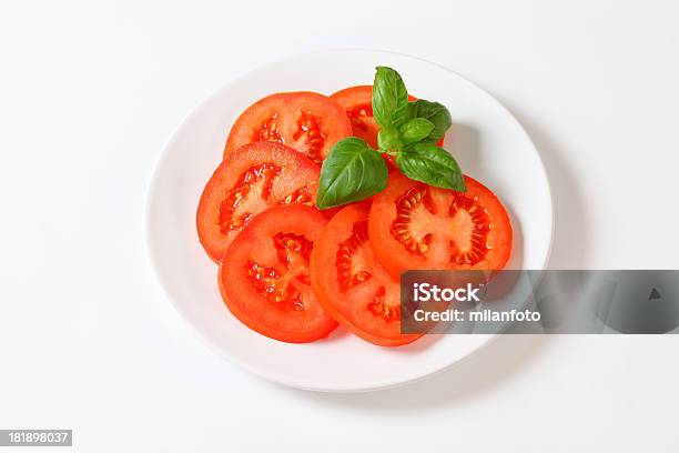 Photo libre de droit de Tranches De Tomates banque d'images et plus d'images libres de droit de Aliment - Aliment, Aliment cru, Aliment en portion