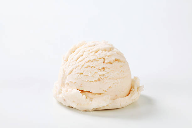 Single scoop of vanilla ice cream on a white background stock photo