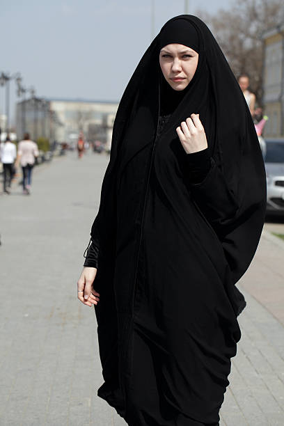 istock young woman in Muslim clothes 181899238