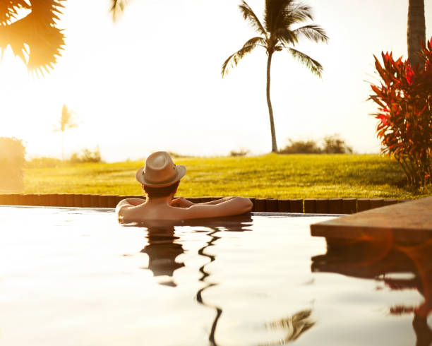 istock Man relaxing in swimming pool 181899325