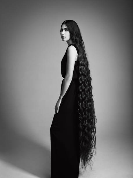 Elegant Woman With Long Hair Stock Photo - Download Image Now - One Woman  Only, Women, In Silhouette - iStock